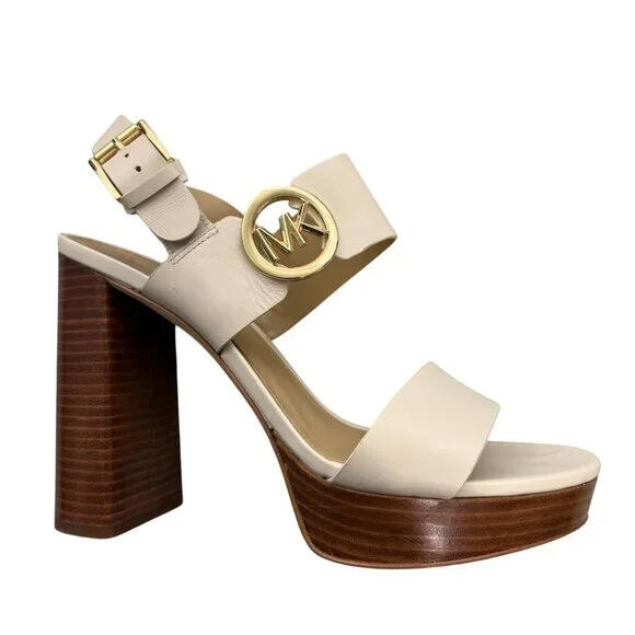 • Leather upper w/ rubber outsole for traction • Heel height = 4 inches. • Platform height = 1 inch. • Michael Kors gold-tone logo • Adjustable buckle strap - Ivory/Cream & Brown - Model: SG21L - Normal wear on soles.